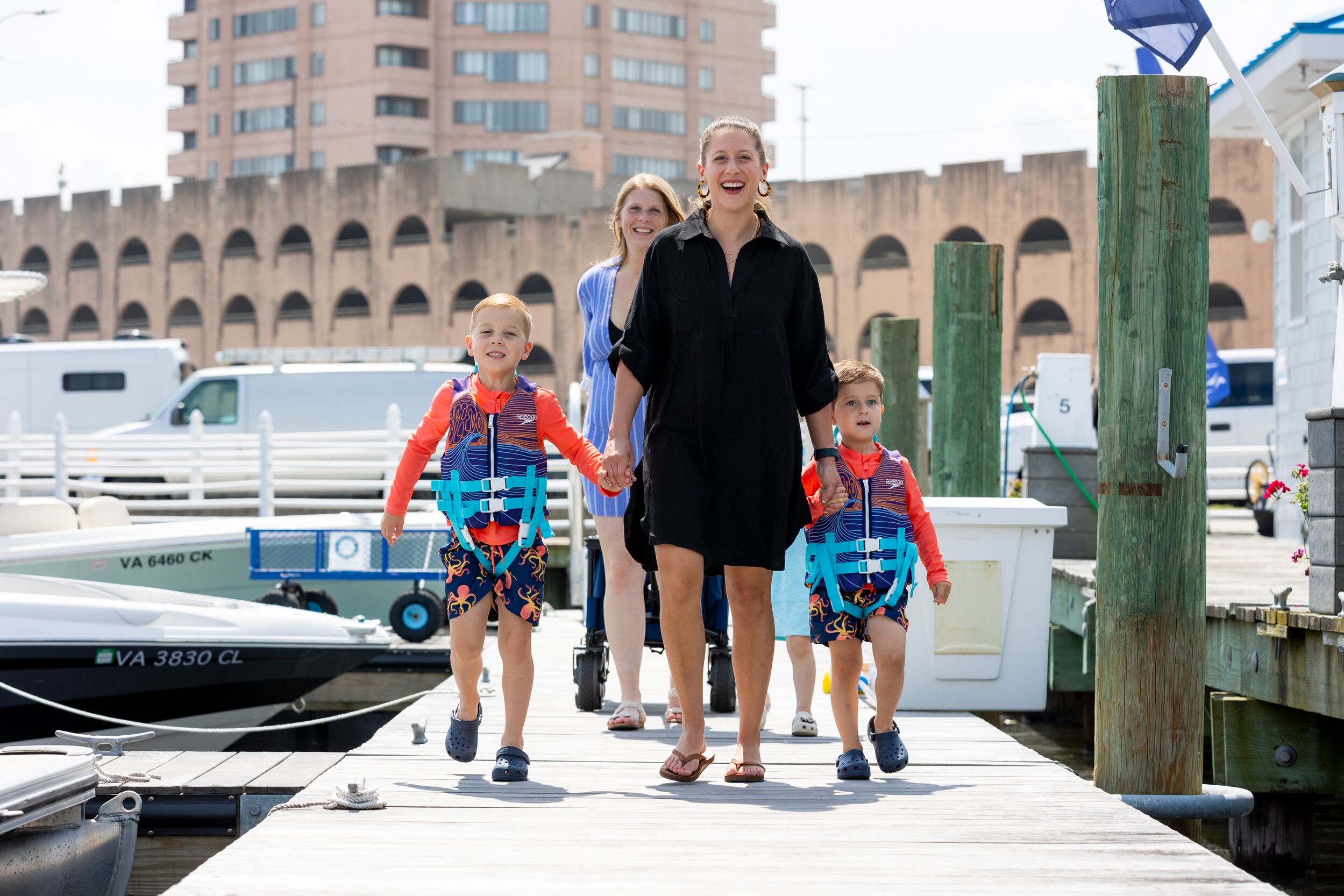 Family on a boat dock.